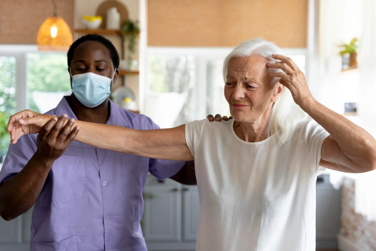 male social worker taking care old woman 1 scaled 2